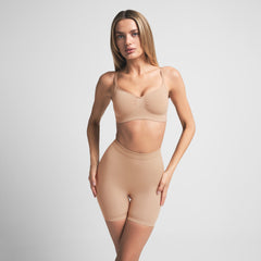 SEAMLESS SCULPT BRALETTE | CLAY ON A MODEL FRONT VIEW