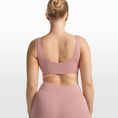 NikeSKIMS MATTE SCOOP NECK BRA | HIMALAYAN ON A MODEL FRONT VIEW @ | FOCUS: 0.0, 1.0, 0.9