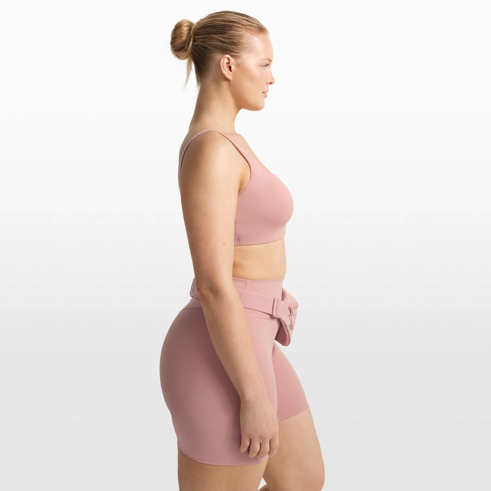 NikeSKIMS MATTE SCOOP NECK BRA | HIMALAYAN ON A MODEL FRONT VIEW @ | FOCUS: 0.0, 1.0, 0.9