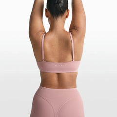NikeSKIMS MATTE MICRO SCOOP BRA | HIMALAYAN ON A MODEL FRONT VIEW @ | FOCUS: 0.0, 1.0, 0.9