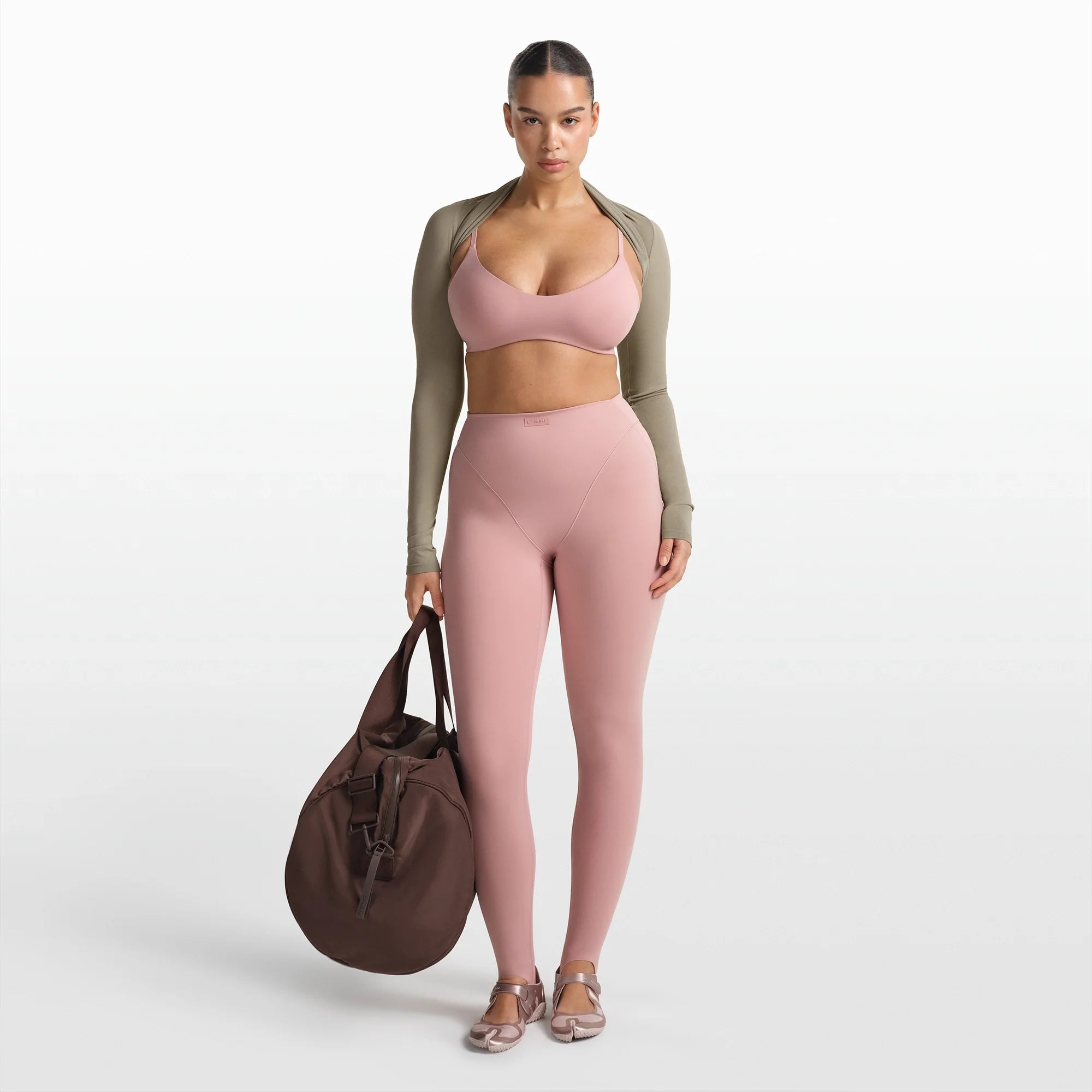 NikeSKIMS MATTE MICRO SCOOP BRA | HIMALAYAN ON A MODEL FRONT VIEW @ | FOCUS: 0.0, 1.0, 0.9