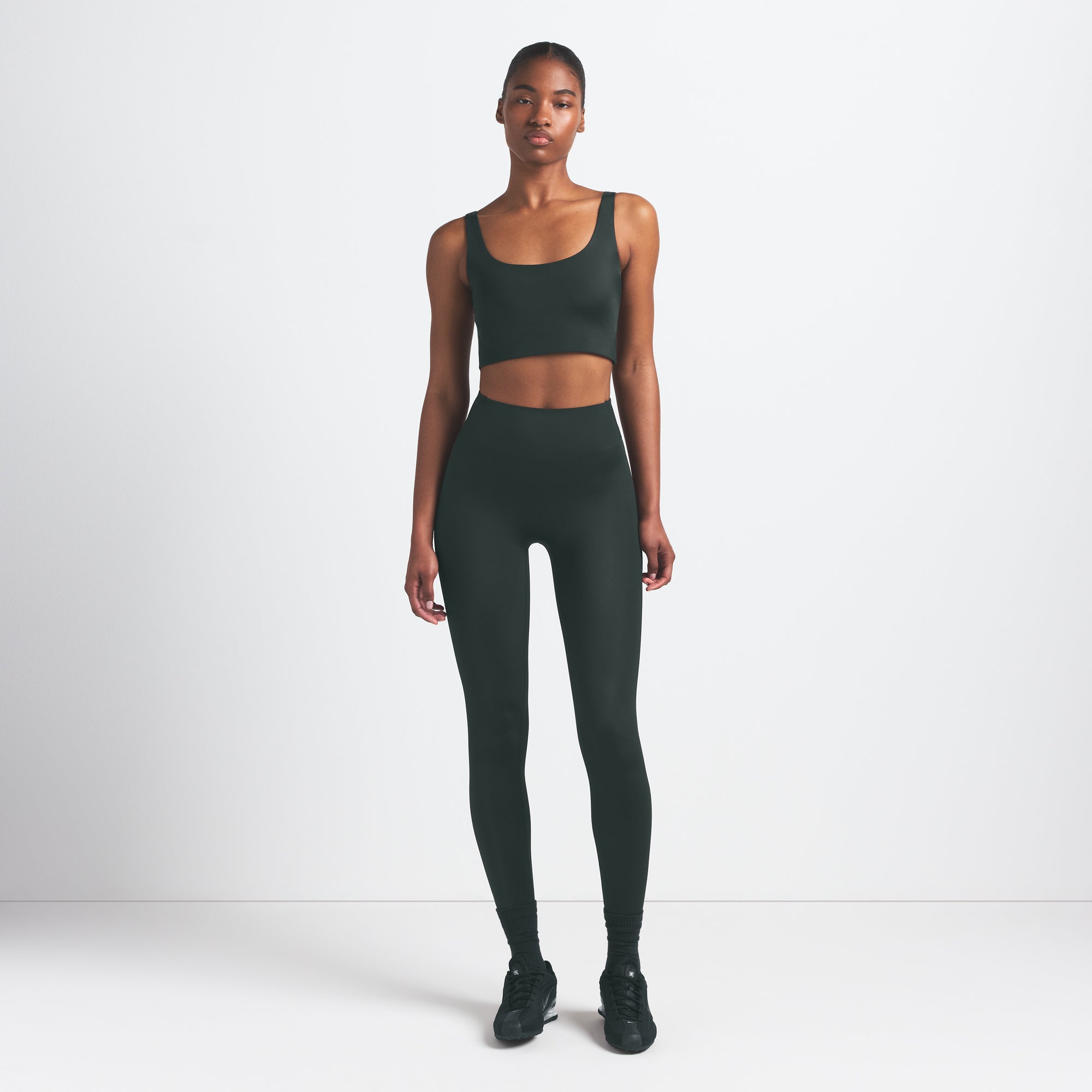 NikeSKIMS SHINE SCOOP NECK BRA TOP | DARK TEAL ON A MODEL FRONT VIEW @ | FOCUS: 0.0, 1.0, 0.9