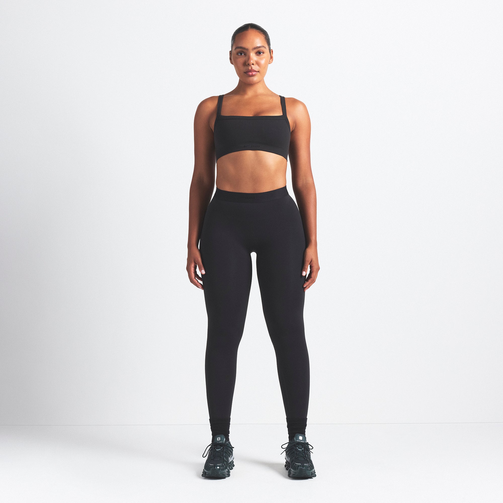 NikeSKIMS VINTAGE SEAMLESS CAMI BRA | OBSIDIAN ON A MODEL FRONT VIEW @ | FOCUS: 0.9, 0.1, 0.7