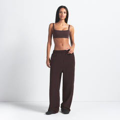 NikeSKIMS VINTAGE SEAMLESS CAMI BRA | PHOENIX ON A MODEL FRONT VIEW @ | FOCUS: 0.9, 0.1, 0.7