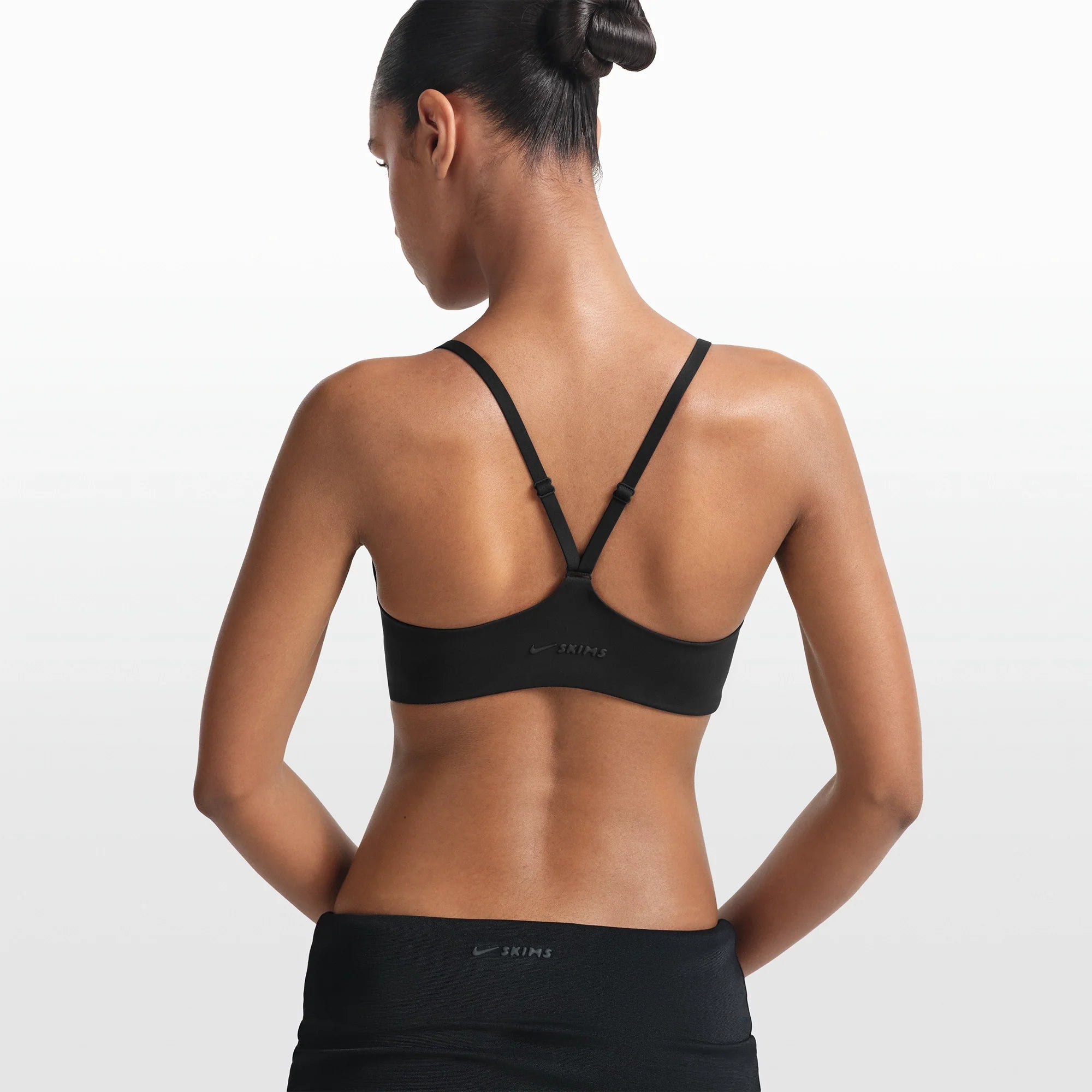 NikeSKIMS MATTE CONTOUR CAMI BRA | OBSIDIAN ON A MODEL FRONT VIEW @ | FOCUS: 0.0, 1.0, 0.9