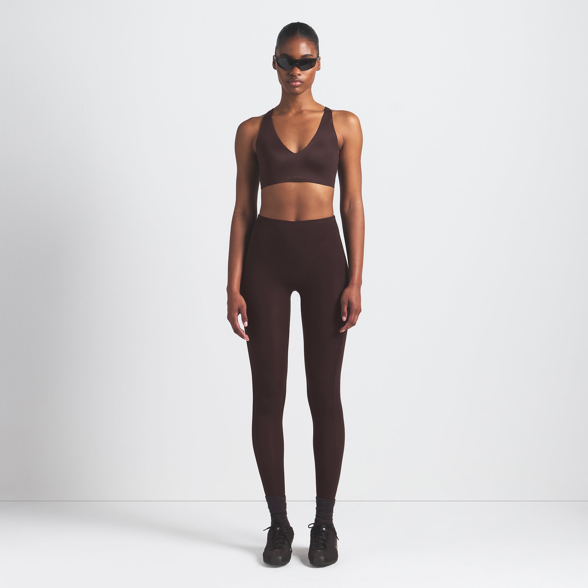 NikeSKIMS SHINE V-NECK BRA | PHOENIX ON A MODEL FRONT VIEW @ | FOCUS: 0.9, 0.1, 0.7