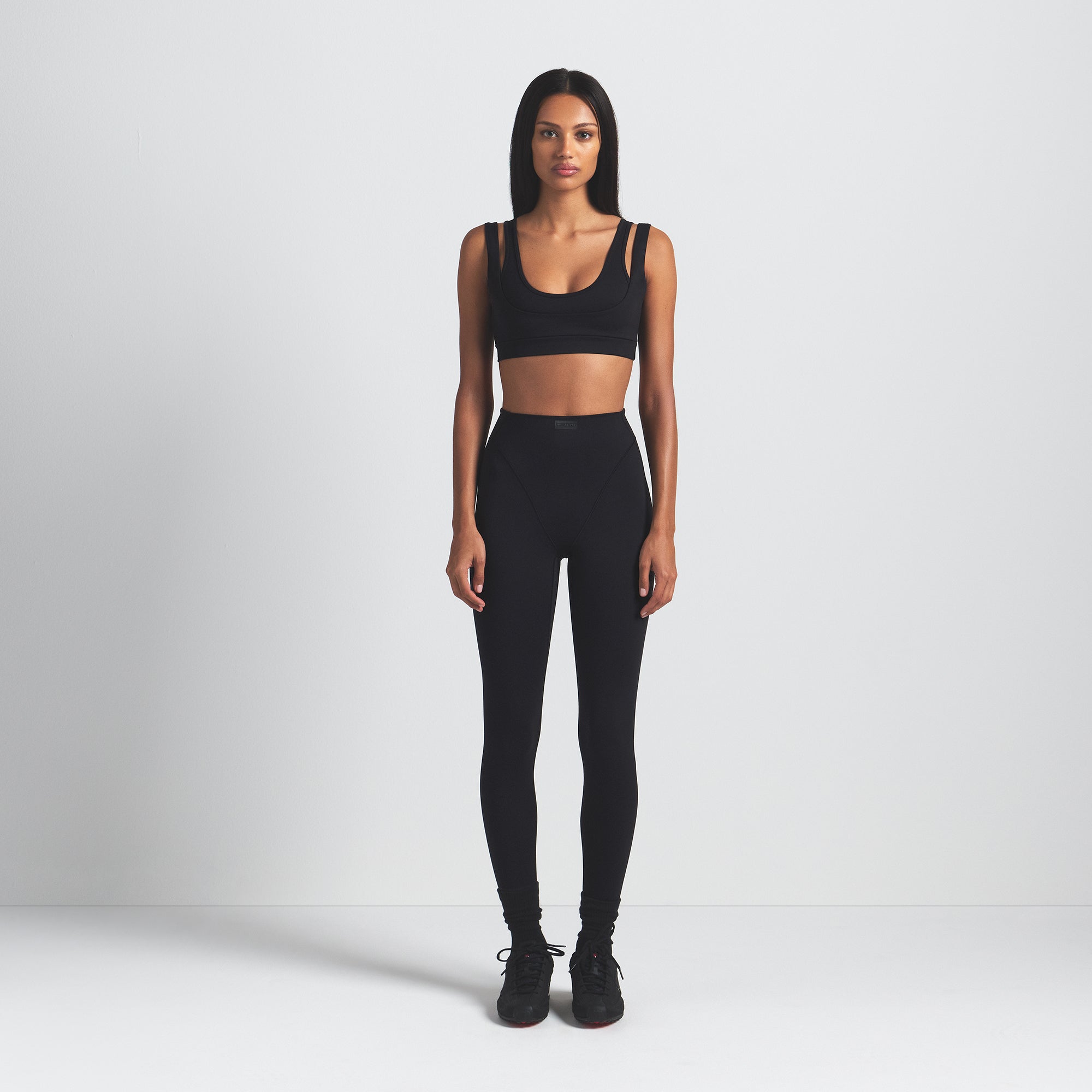 NikeSKIMS MATTE DOUBLE STRAP SCOOP BRA | OBSIDIAN ON A MODEL FRONT VIEW @ | FOCUS: 0.0, 1.0, 0.9