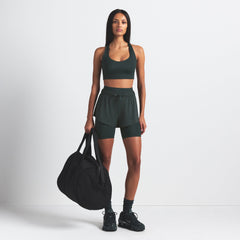 NikeSKIMS SHINE RACER BACK BRA | DARK TEAL ON A MODEL FRONT VIEW @ | FOCUS: 0.0, 1.0, 0.9