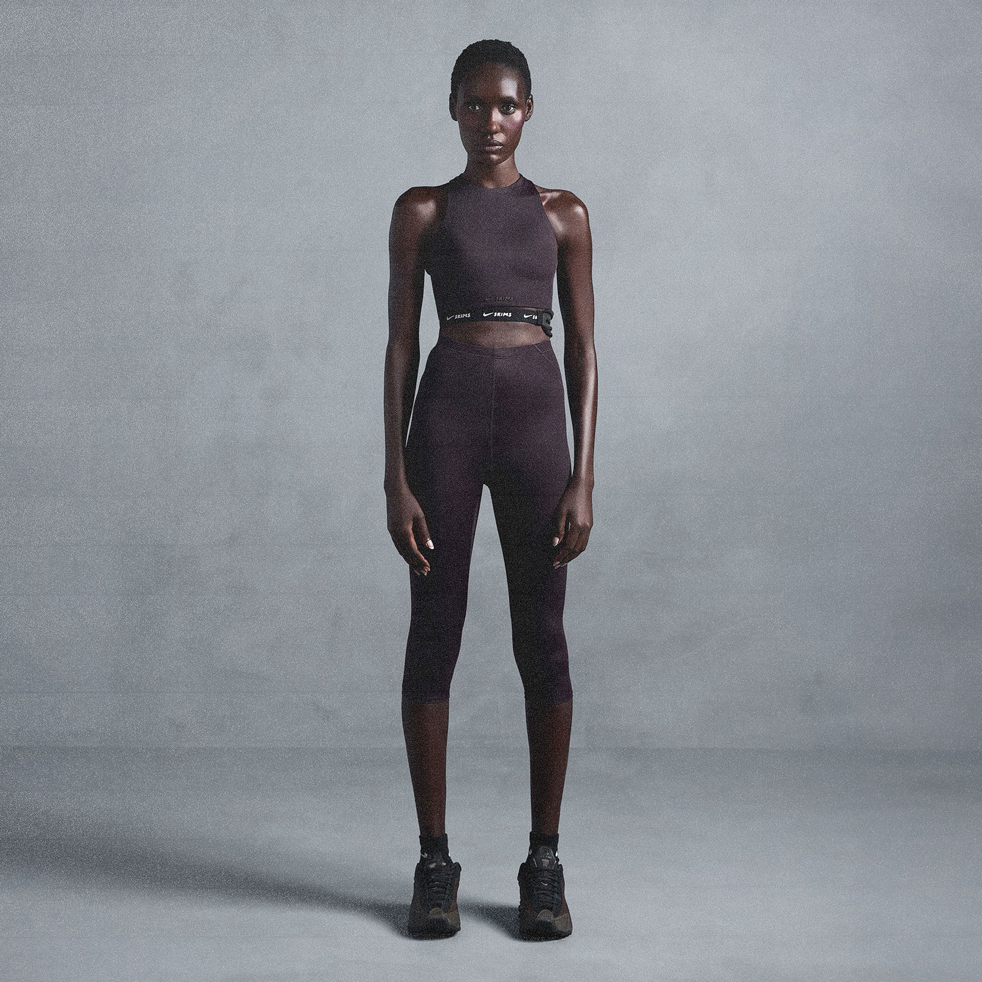 NikeSKIMS SHINE HIGH NECK BRA | PHOENIX ON A MODEL SIDE VIEW @ | FOCUS: 0.0, 1.0, 0.9