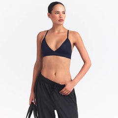 NikeSKIMS SHINE TRIANGLE BRA | NAVY ON A MODEL SIDE VIEW @ | FOCUS: 0.0, 1.0, 0.9