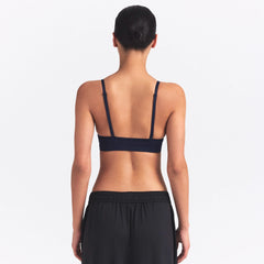 NikeSKIMS SHINE TRIANGLE BRA | NAVY ON A MODEL SIDE VIEW @ | FOCUS: 0.0, 1.0, 0.9