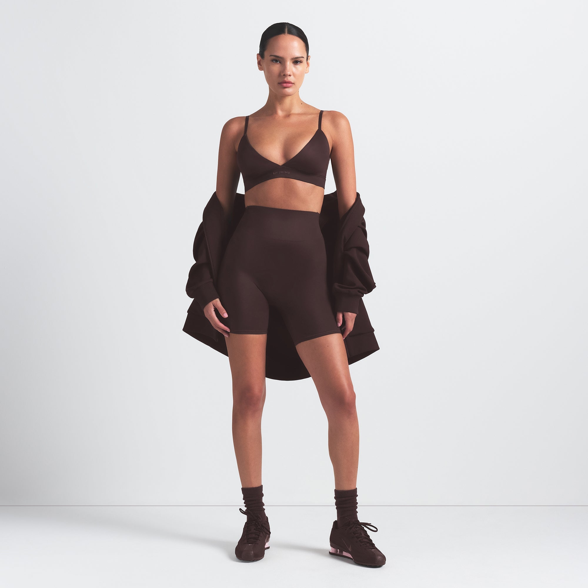 NikeSKIMS SHINE TRIANGLE BRA | PHOENIX ON A MODEL FRONT VIEW @ | FOCUS: 0.9, 0.1, 0.7