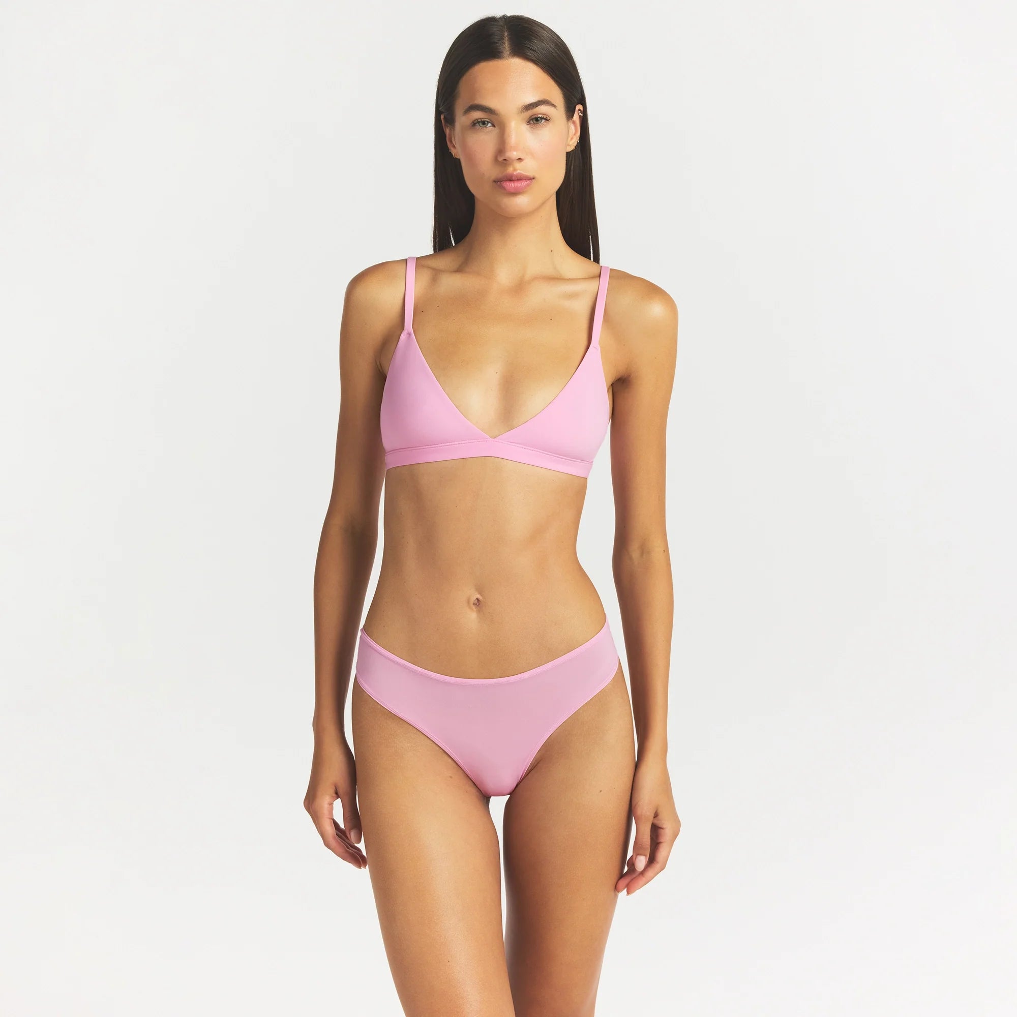 FITS EVERYBODY TRIANGLE BRALETTE | BUBBLE GUM ON A MODEL SIDE VIEW @ | FOCUS: 0.0, 1.0, 0.9