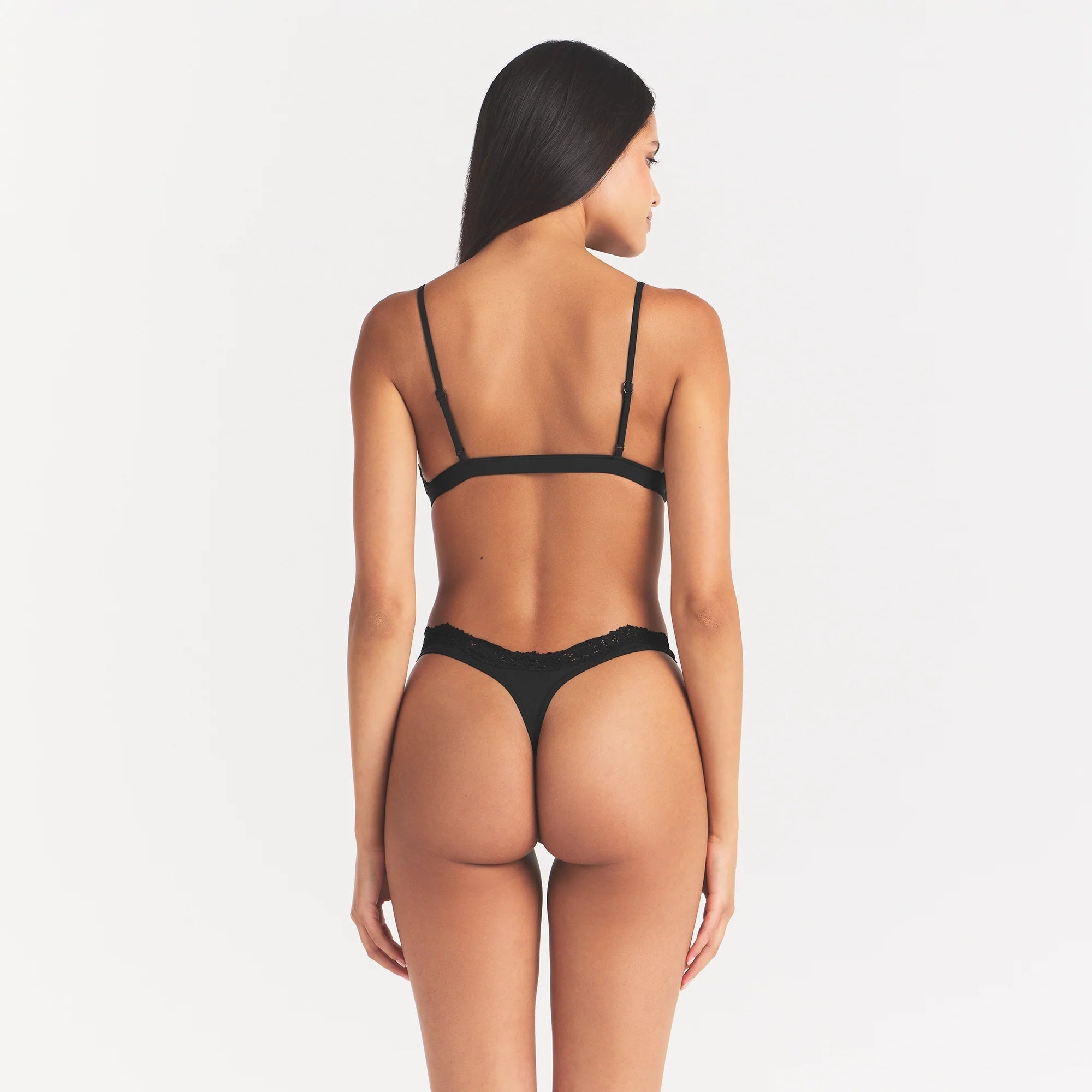 FITS EVERYBODY LACE TRIANGLE BRALETTE | ONYX & LAYS FLAT ON A WHITE BACKGROUND | FLT