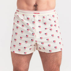 SKIMS FOR TEAM USA COTTON POPLIN MENS OLYMPIC BOXER | ECRU ON A MODEL SIDE VIEW @ | FOCUS: 0.0, 1.0, 0.9
