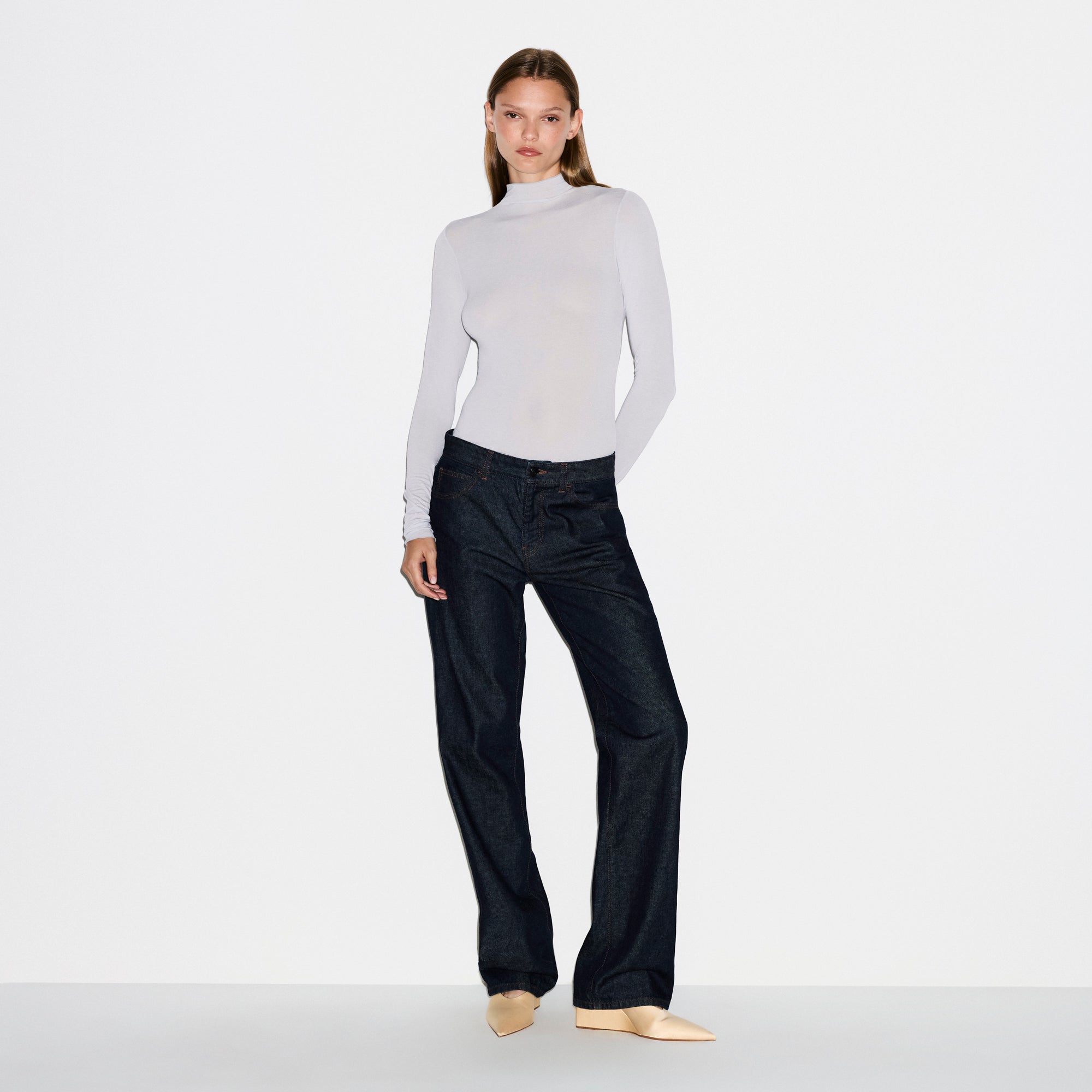 SHEER MODAL LONG SLEEVE TURTLENECK BODYSUIT | MIST ON A MODEL FRONT VIEW @ | FOCUS: 0.0, 1.0, 0.9