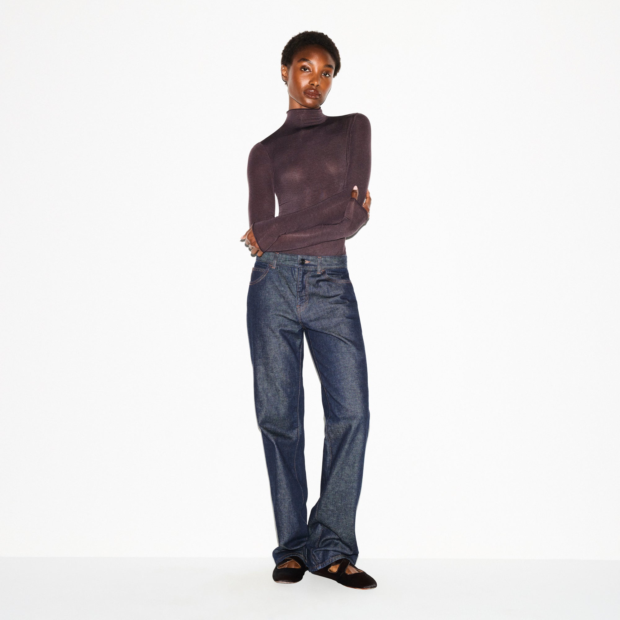 SHEER MODAL LONG SLEEVE TURTLENECK BODYSUIT | PHOENIX ON A MODEL FRONT VIEW @ | FOCUS: 0.0, 1.0, 0.9
