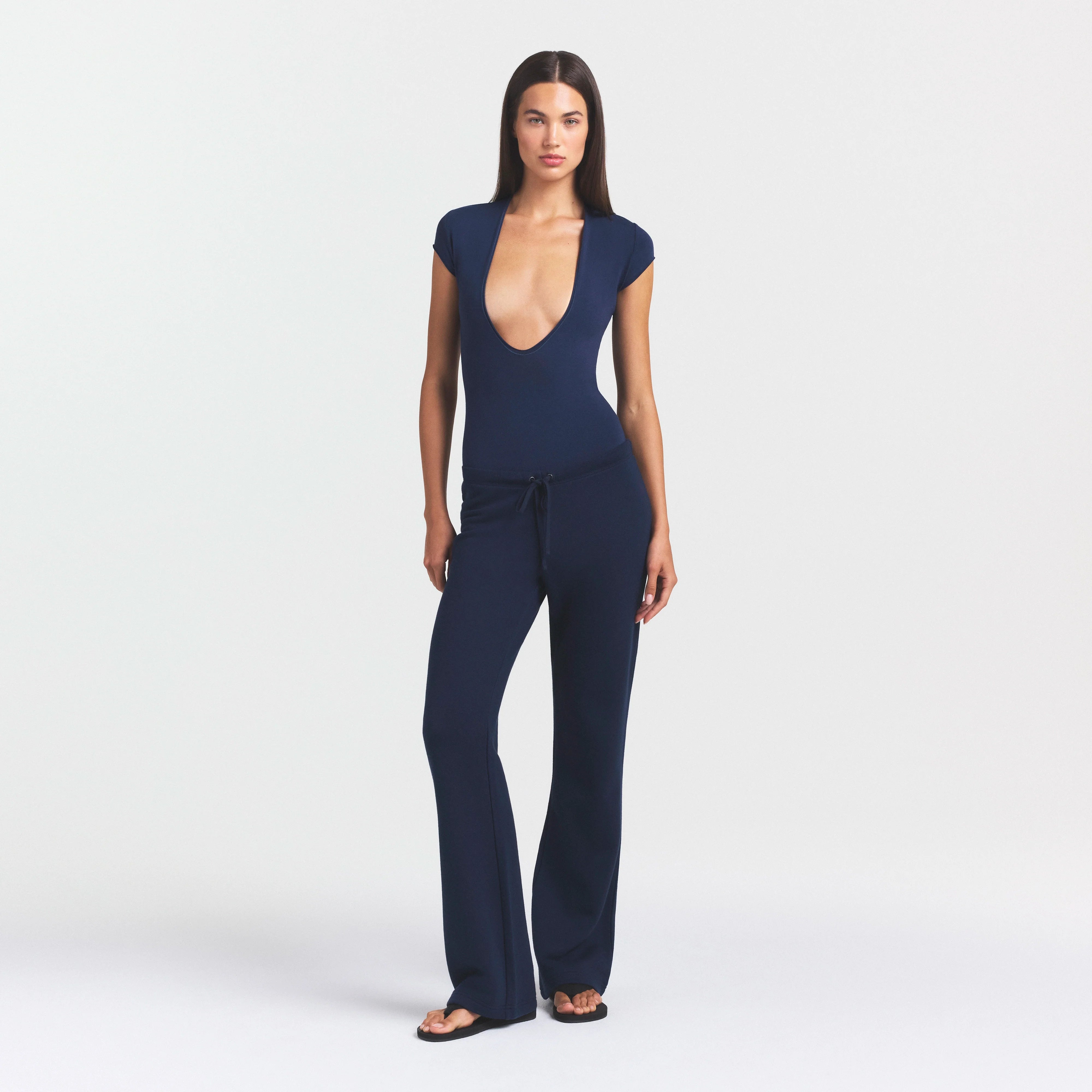 COTTON JERSEY DEEP PLUNGE BODYSUIT | NAVY ON A MODEL FRONT VIEW @ | FOCUS: 0.0, 1.0, 0.9