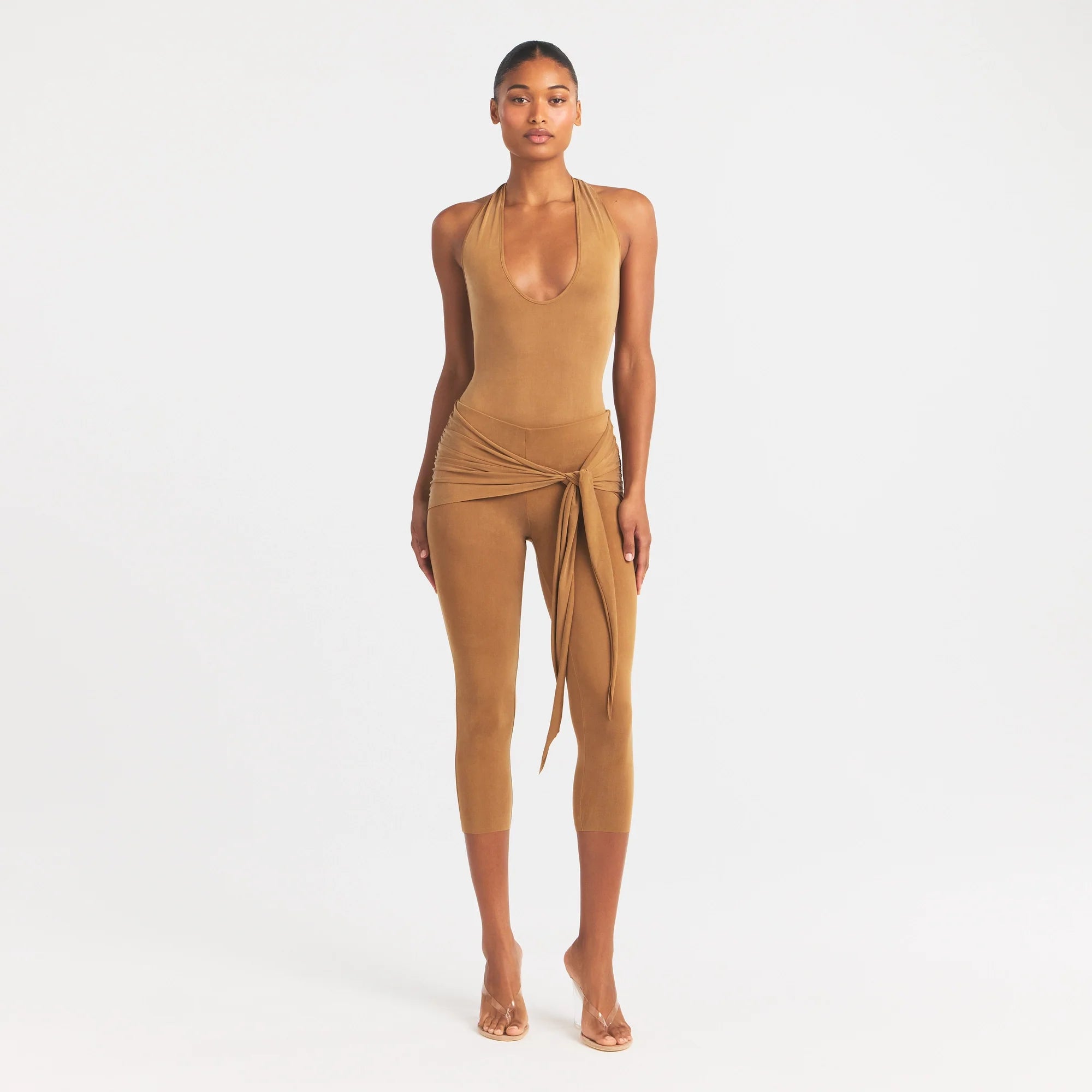 CUPRO JERSEY HALTER BODYSUIT | ALMOND ON A MODEL FRONT VIEW @ | FOCUS: 0.0, 1.0, 0.9