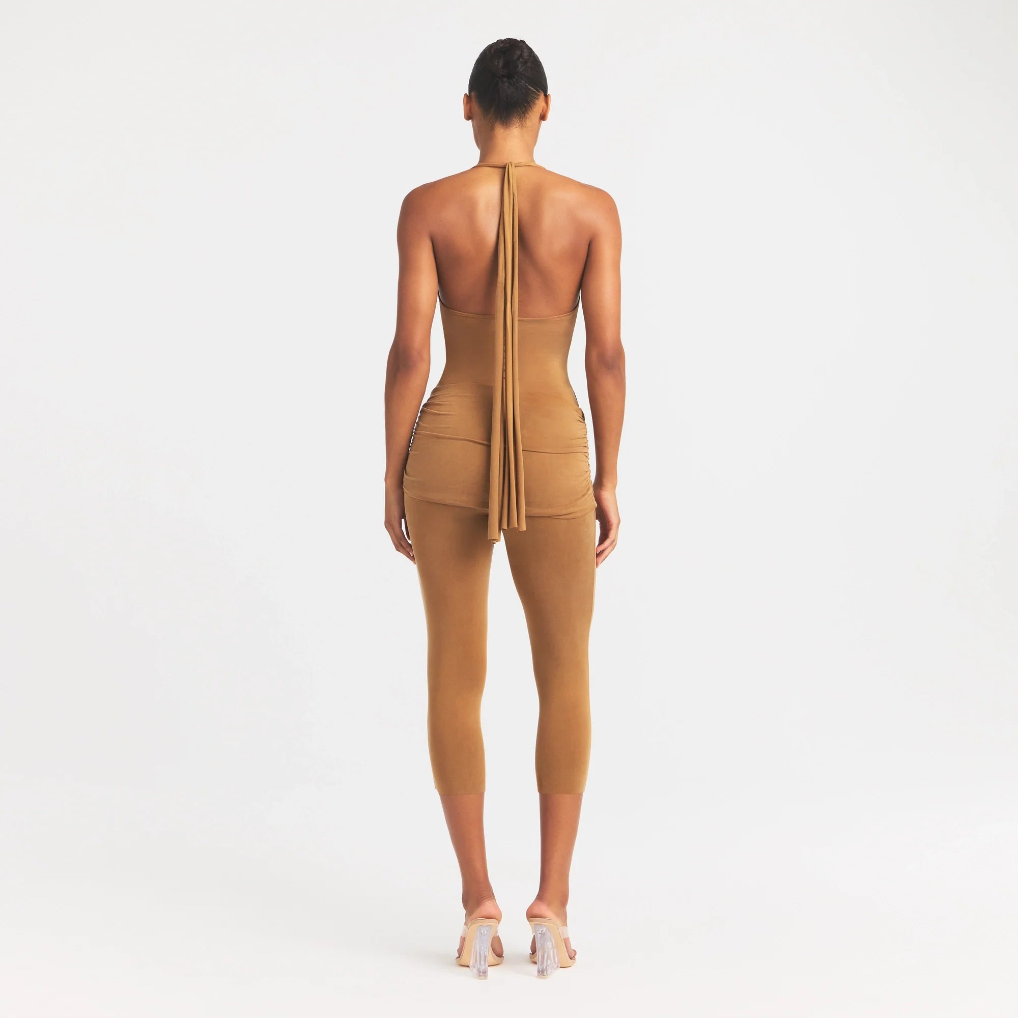 CUPRO JERSEY HALTER BODYSUIT | ALMOND ON A MODEL FRONT VIEW @ | FOCUS: 0.0, 1.0, 0.9