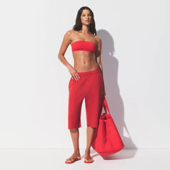 ICONIC SWIM MICRO BANDEAU BIKINI TOP | CARMINE ON A MODEL FRONT VIEW 