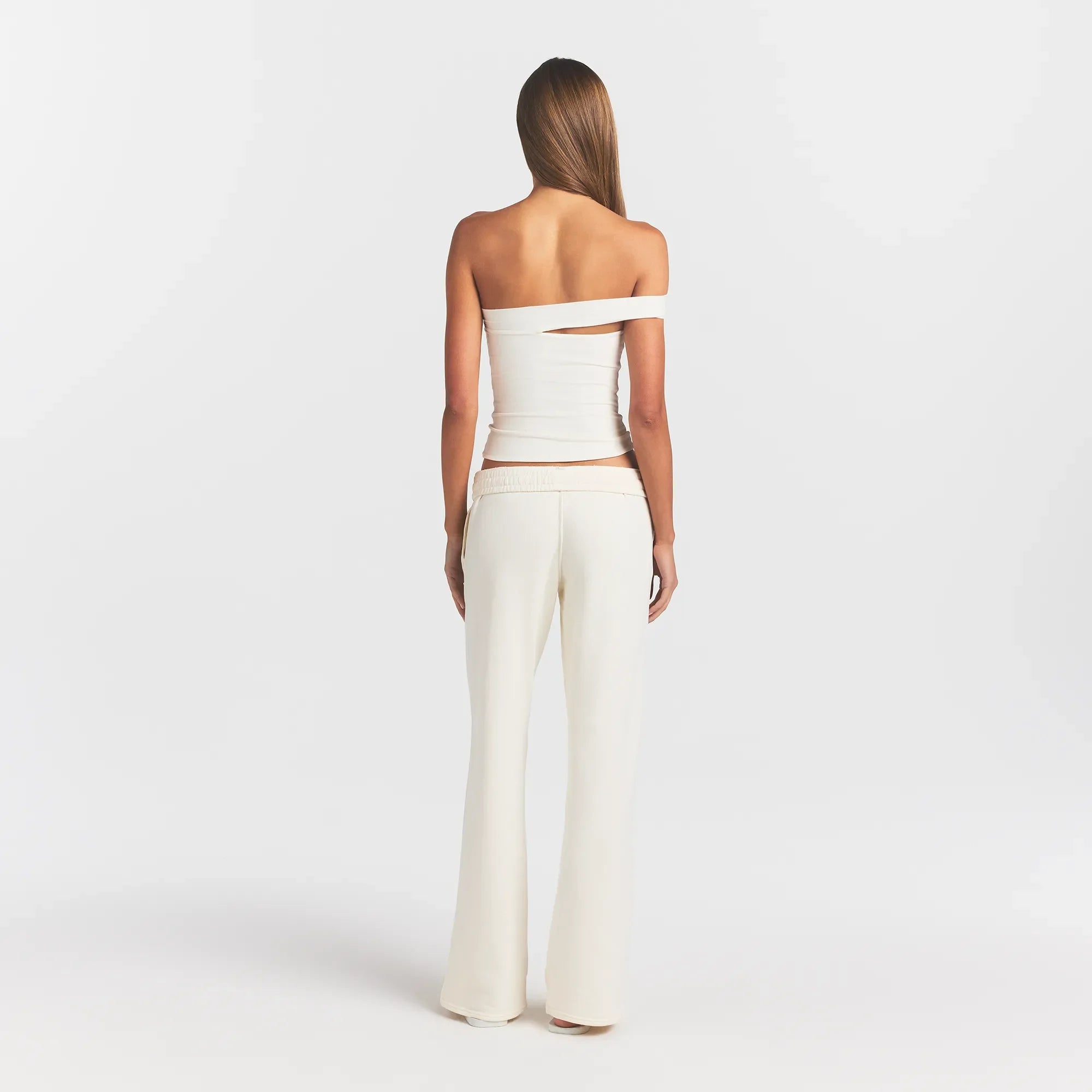 FRENCH TERRY STRAIGHT LEG PANT | ECRU ON A MODEL BACK VIEW @ | FOCUS: 0.0, 1.0, 0.9