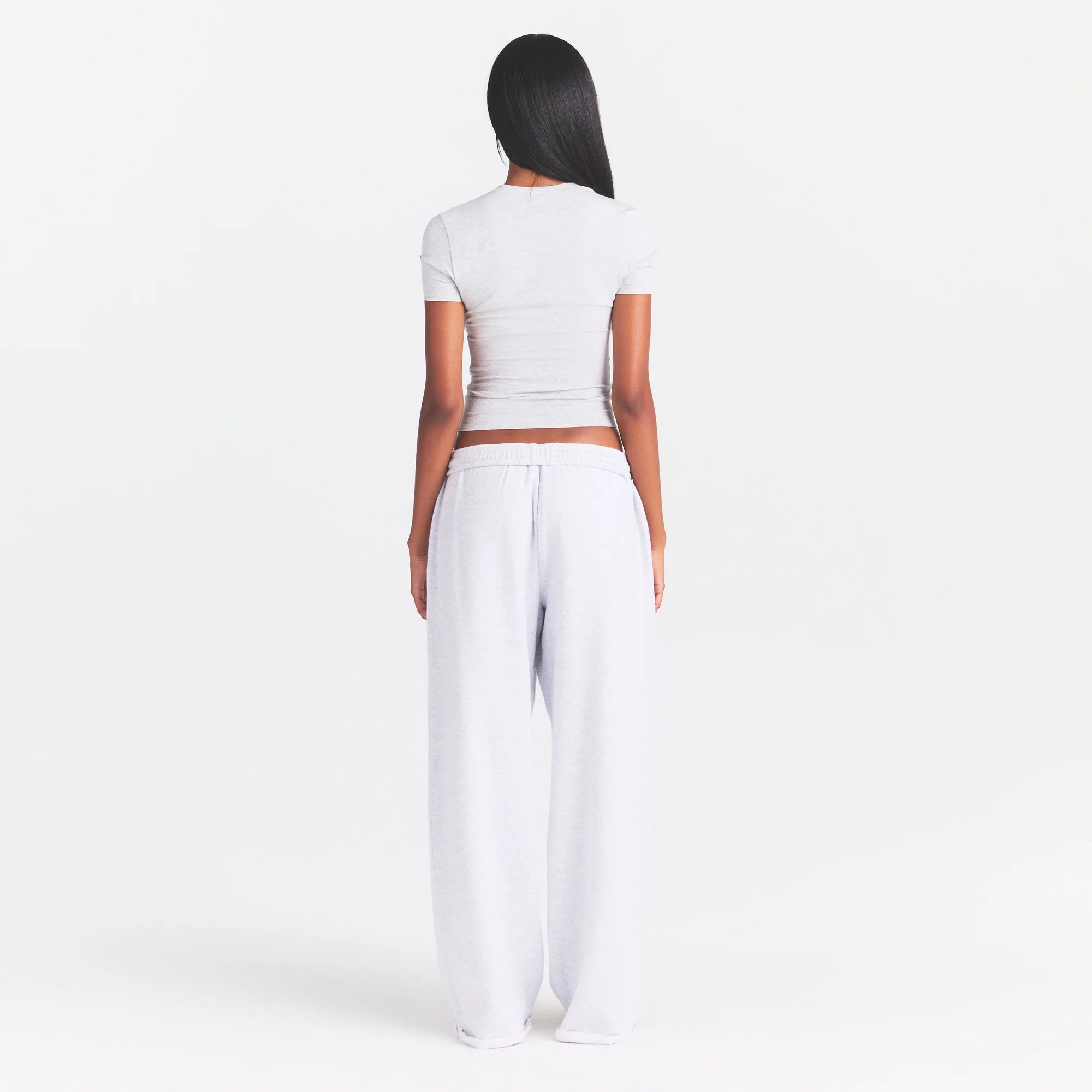 COTTON FLEECE OVERSIZED STRAIGHT LEG PANT | LIGHT HEATHER GREY ON A MODEL FRONT VIEW @ | FOCUS: 0.0, 1.0, 0.9