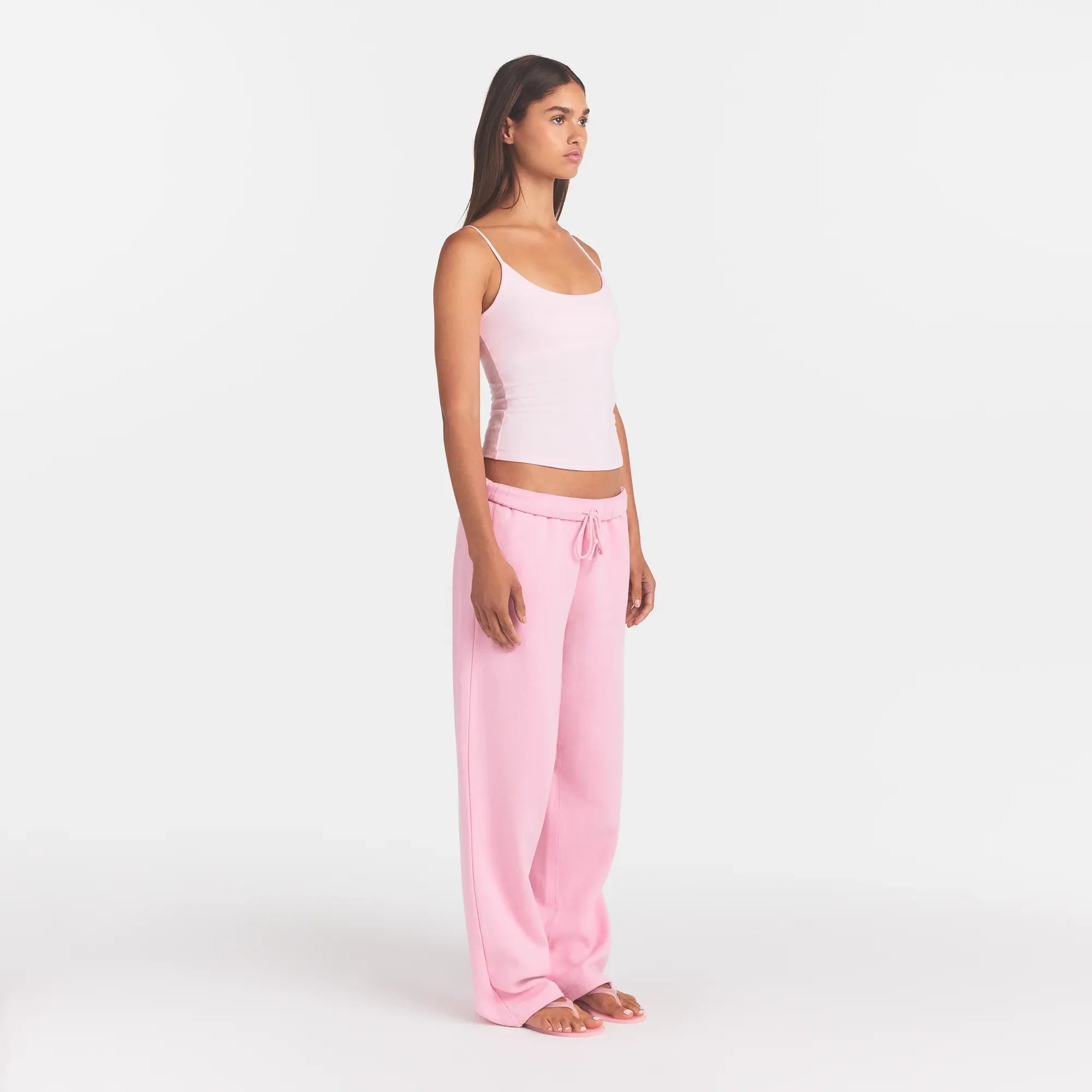 COTTON FLEECE CLASSIC STRAIGHT LEG PANT | HALITE WITH SNOW LOGO ON A MODEL SIDE VIEW @ | FOCUS: 0.0, 1.0, 0.9