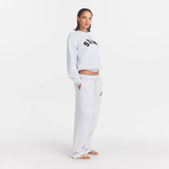 COTTON FLEECE CLASSIC STRAIGHT LEG PANT | LIGHT HEATHER GREY WITH ONYX LOGO ON A MODEL SIDE VIEW @ | FOCUS: 0.0, 1.0, 0.9