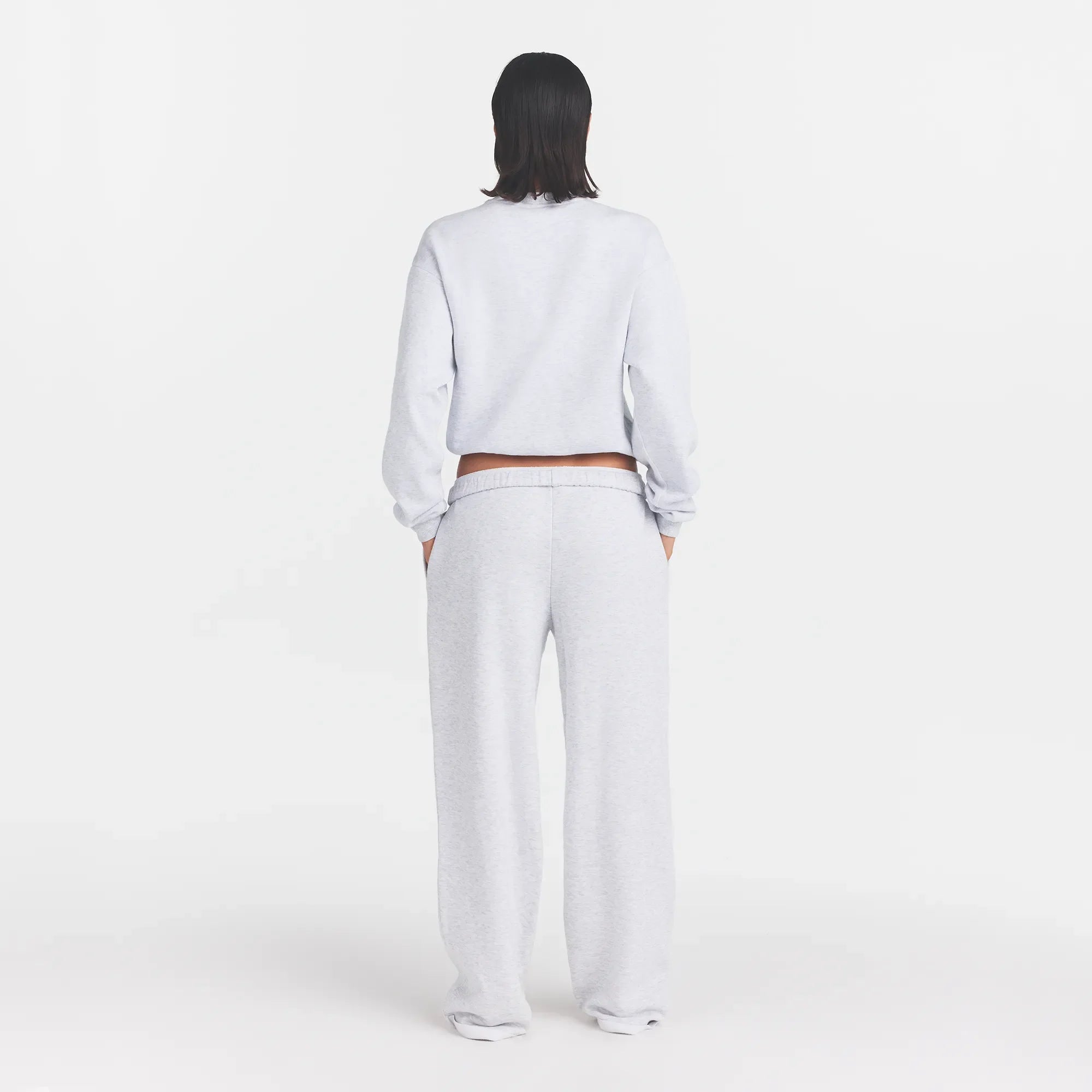 COTTON FLEECE CLASSIC STRAIGHT LEG PANT | LIGHT HEATHER GREY WITH ONYX LOGO ON A MODEL BACK VIEW @ | FOCUS: 0.0, 1.0, 0.9