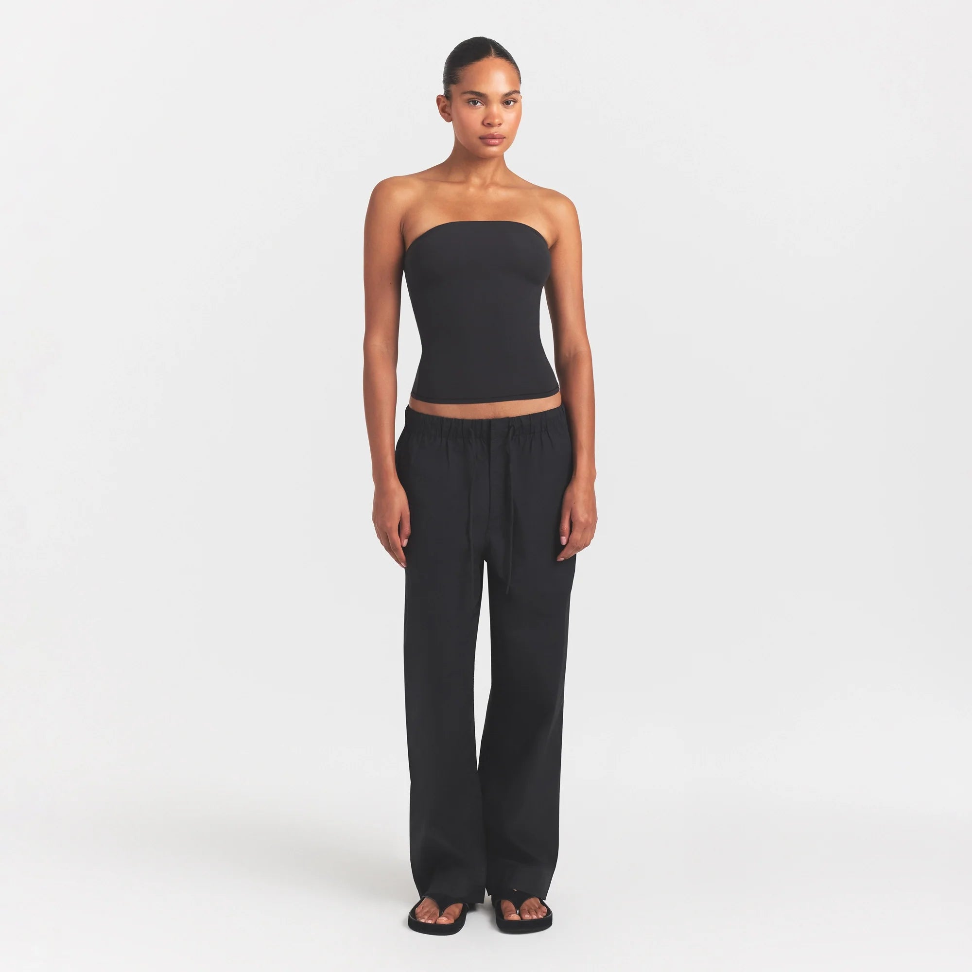 WOVEN COTTON OVERSIZED STRAIGHT LEG PANT | ONYX ON A MODEL FRONT VIEW @ | FOCUS: 0.0, 1.0, 0.9