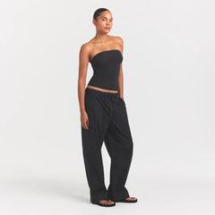 WOVEN COTTON OVERSIZED STRAIGHT LEG PANT | ONYX ON A MODEL FRONT VIEW @ | FOCUS: 0.0, 1.0, 0.9
