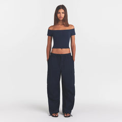 WOVEN COTTON OVERSIZED LOW RISE CARGO PANT | NAVY ON A MODEL FRONT VIEW @ | FOCUS: 0.0, 1.0, 0.9