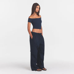 WOVEN COTTON OVERSIZED LOW RISE CARGO PANT | NAVY ON A MODEL FRONT VIEW @ | FOCUS: 0.0, 1.0, 0.9