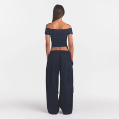 WOVEN COTTON OVERSIZED LOW RISE CARGO PANT | NAVY ON A MODEL FRONT VIEW @ | FOCUS: 0.0, 1.0, 0.9