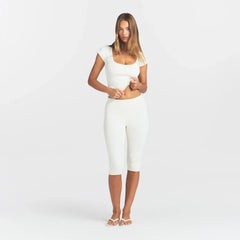 REFINED KNIT CAPRI | EGRET ON A MODEL FRONT VIEW @ | FOCUS: 0.0, 1.0, 0.9