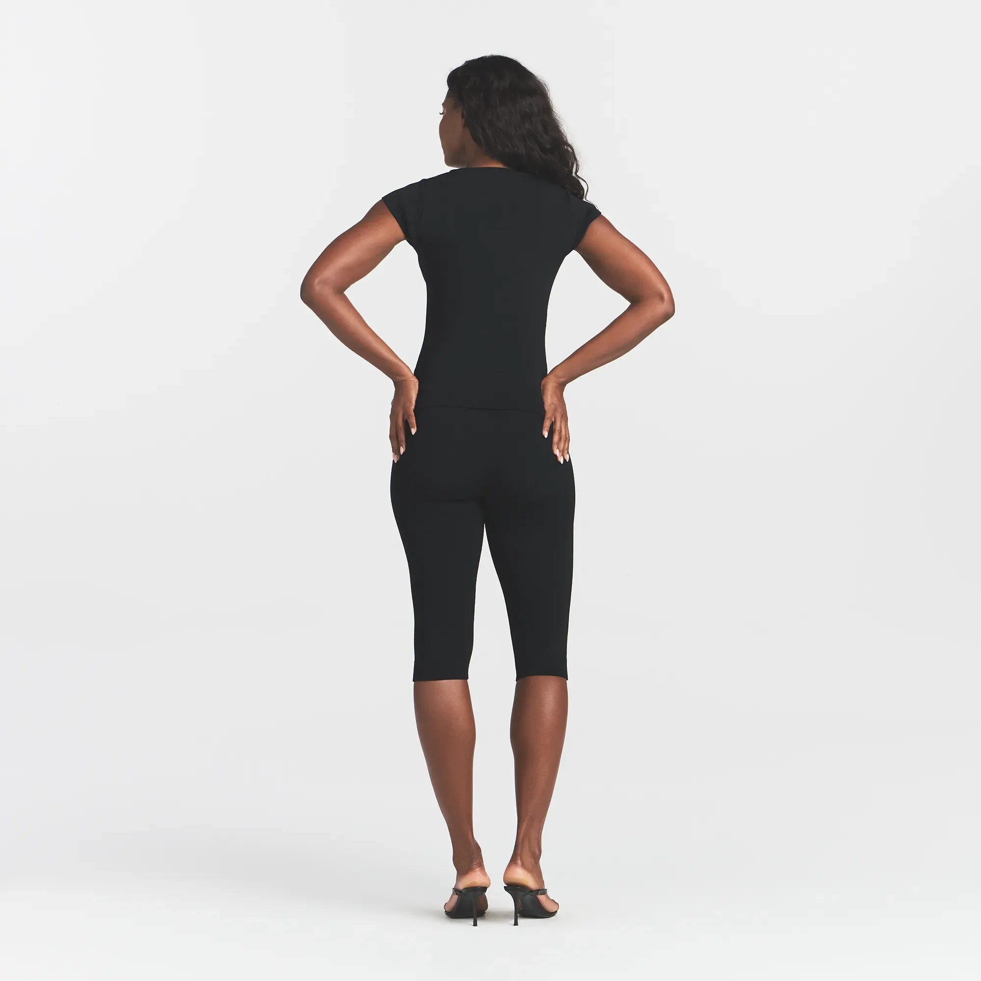 REFINED KNIT CAPRI | OBSIDIAN ON A MODEL FRONT VIEW @ | FOCUS: 0.0, 1.0, 0.9