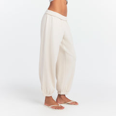 DRAPEY FRENCH TERRY CROPPED JOGGER | BUFF ON A MODEL SIDE VIEW @ | FOCUS: 0.0, 1.0, 0.9