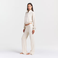 DRAPEY FRENCH TERRY STRAIGHT LEG PANT | BUFF ON A MODEL SIDE VIEW @ | FOCUS: 0.0, 1.0, 0.9