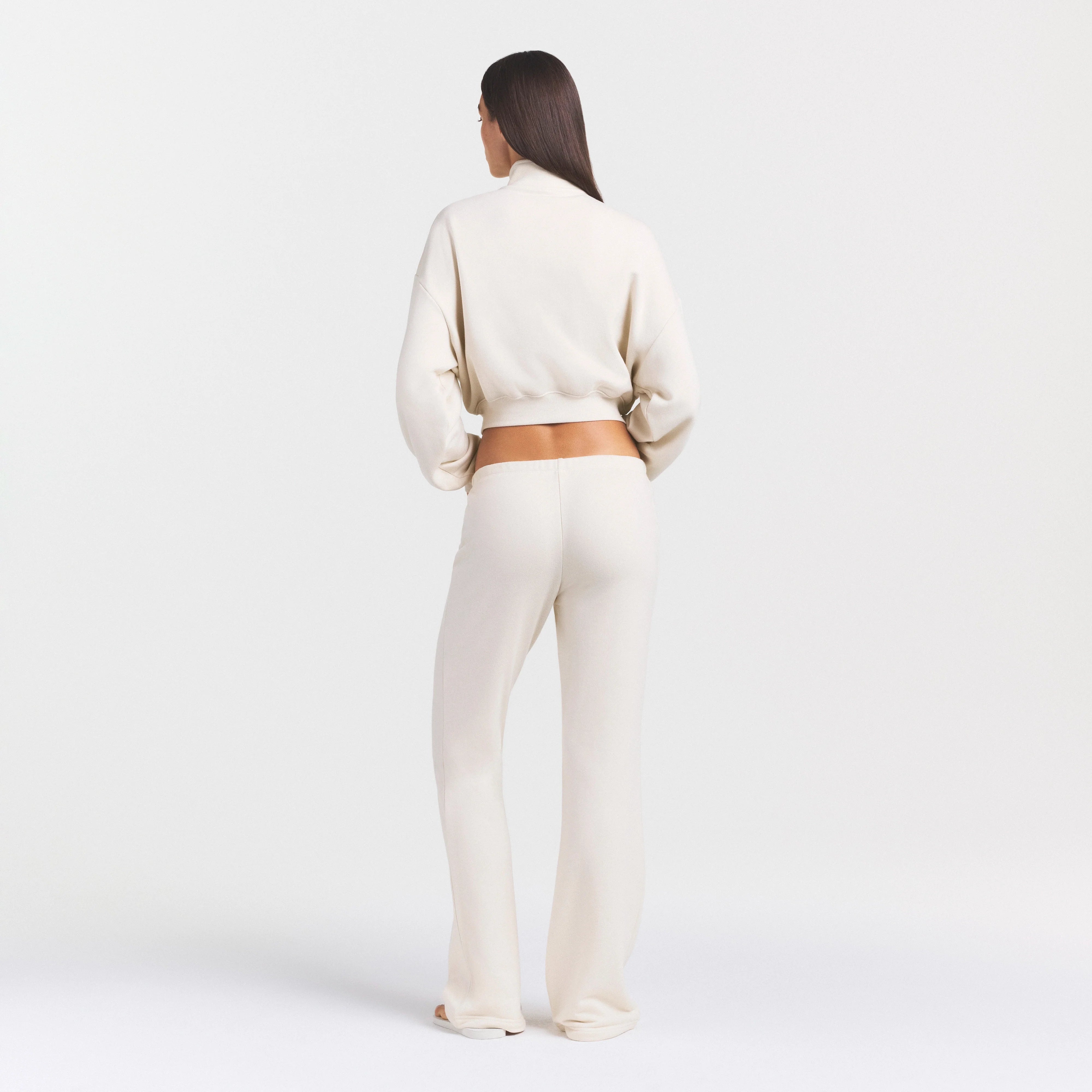 DRAPEY FRENCH TERRY STRAIGHT LEG PANT | BUFF ON A MODEL SIDE VIEW @ | FOCUS: 0.0, 1.0, 0.9