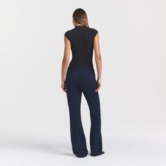 DRAPEY FRENCH TERRY STRAIGHT LEG PANT | NAVY ON A MODEL SIDE VIEW @ | FOCUS: 0.0, 1.0, 0.9