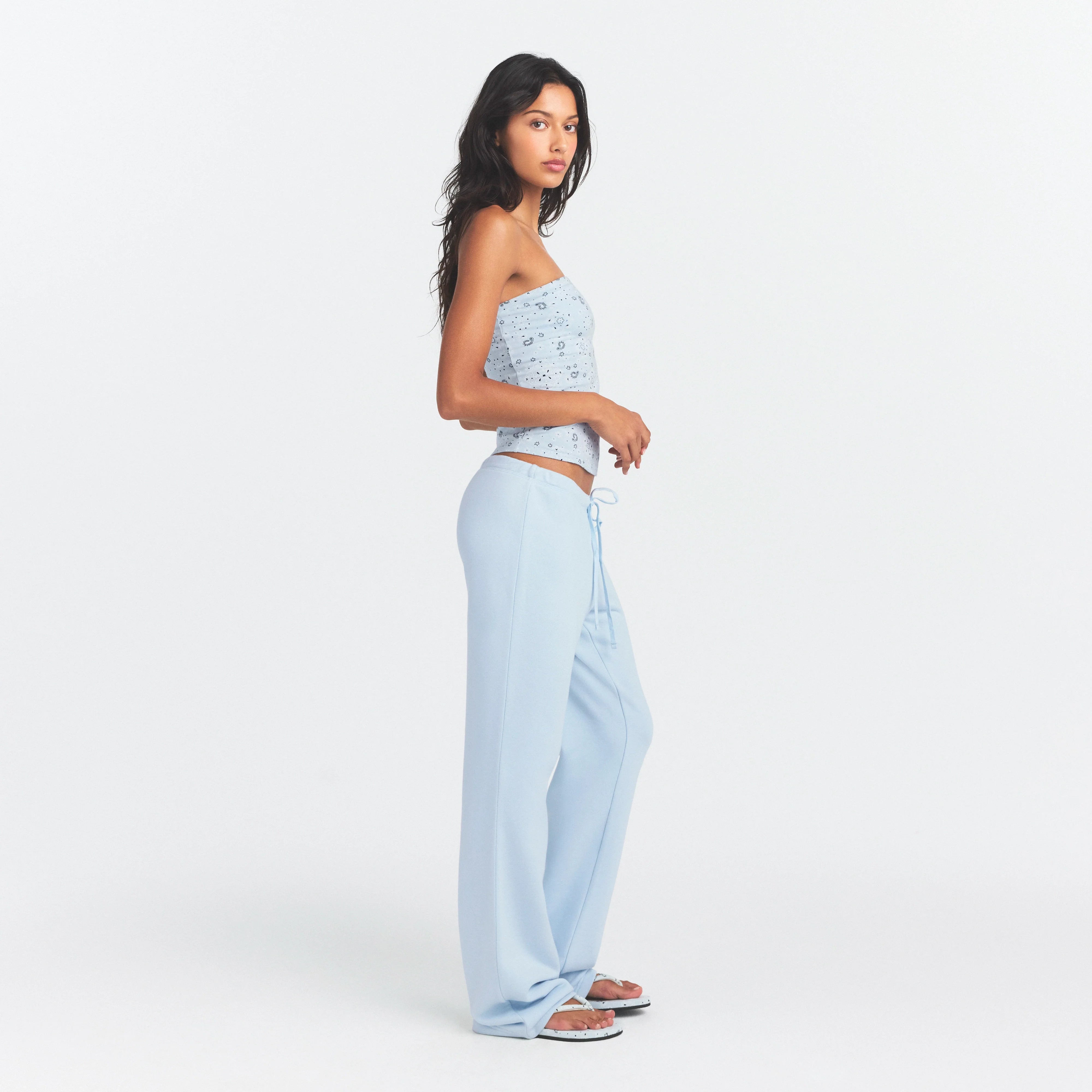 DRAPEY FRENCH TERRY STRAIGHT LEG PANT | POWDER BLUE ON A MODEL SIDE VIEW @ | FOCUS: 0.0, 1.0, 0.9