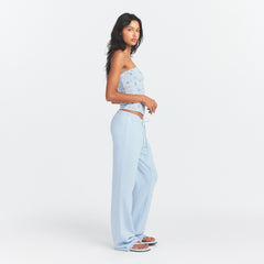 DRAPEY FRENCH TERRY STRAIGHT LEG PANT | POWDER BLUE ON A MODEL SIDE VIEW @ | FOCUS: 0.0, 1.0, 0.9