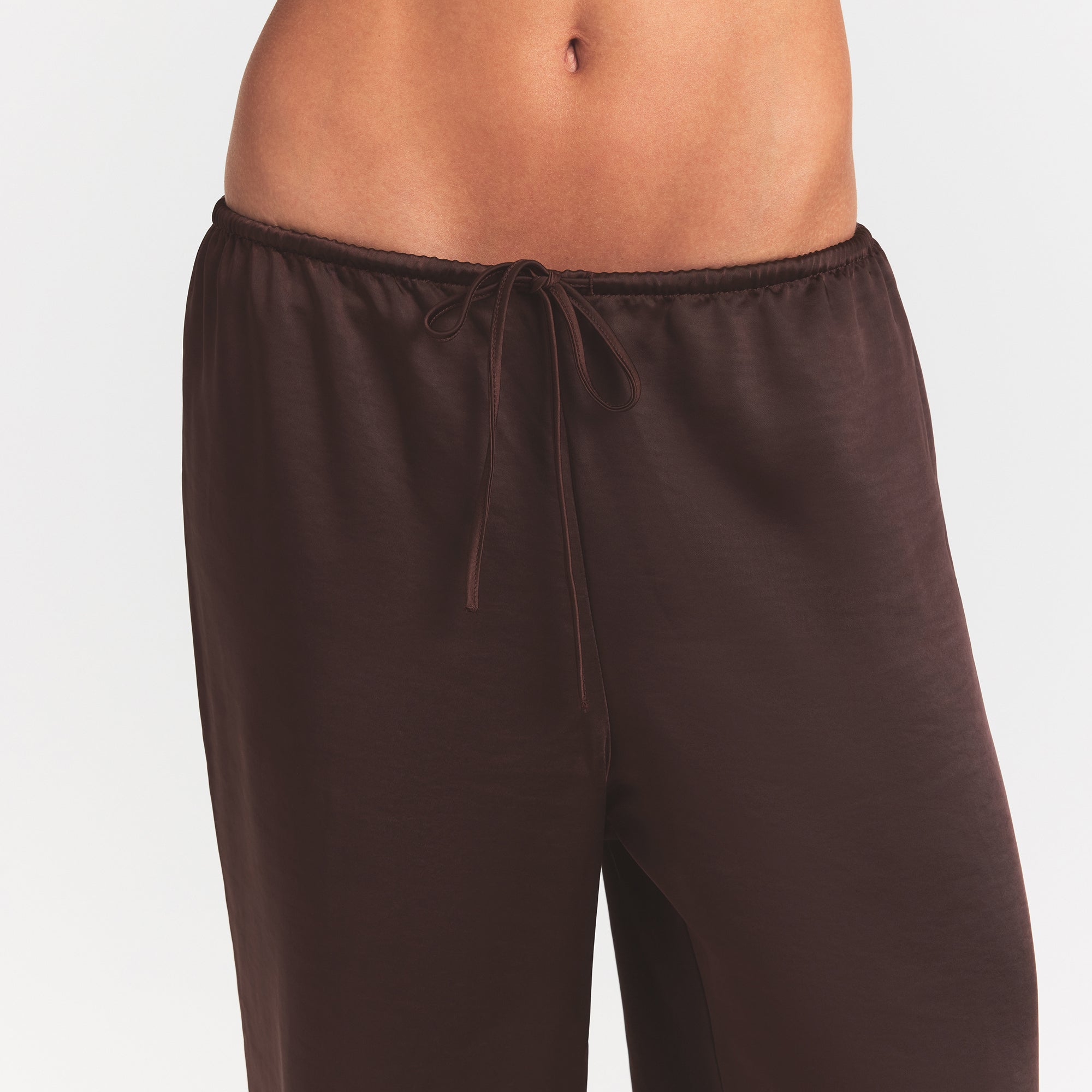 LIGHTWEIGHT SATIN STRAIGHT LEG PANT | ESPRESSO ON A MODEL SIDE VIEW @ | FOCUS: 0.0, 1.0, 0.9