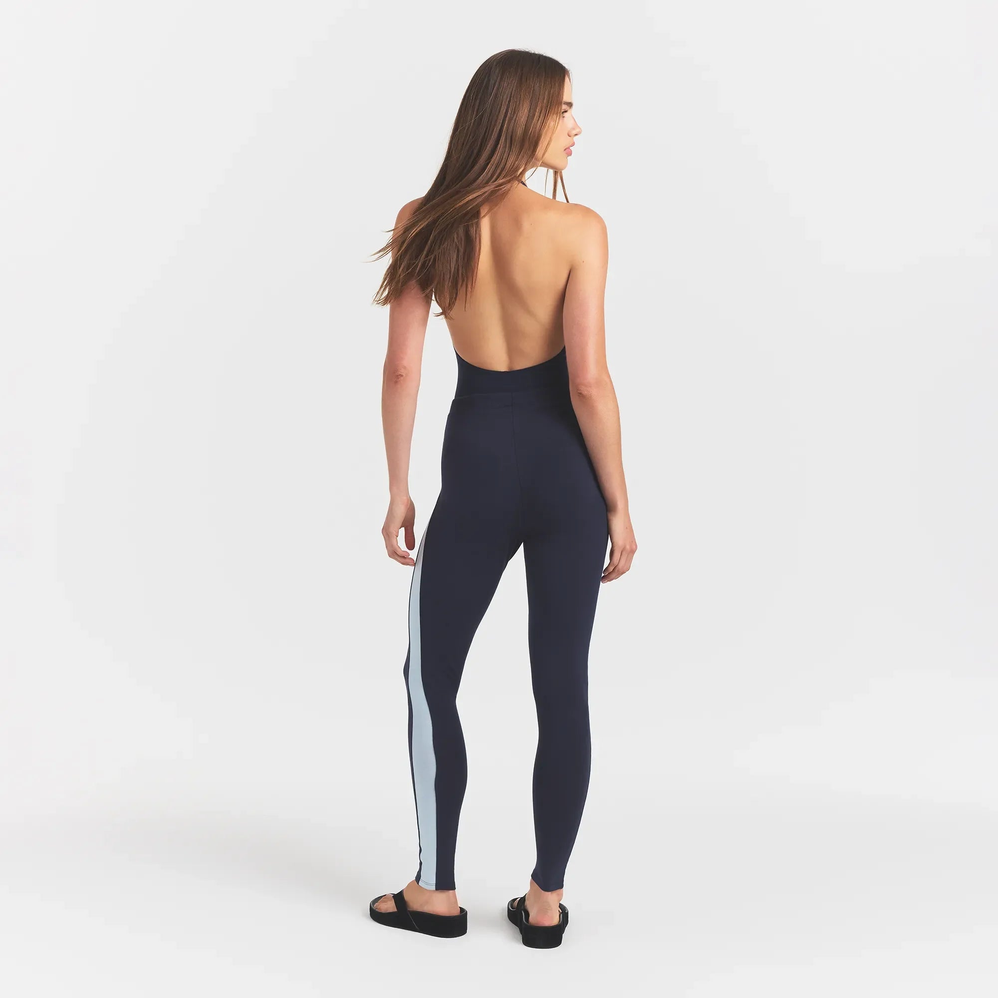 OUTDOOR HIGH-WAISTED LEGGING | NAVY WITH OPAL ON A MODEL BACKVIEW @ | FOCUS: 0.0, 1.0, 0.9