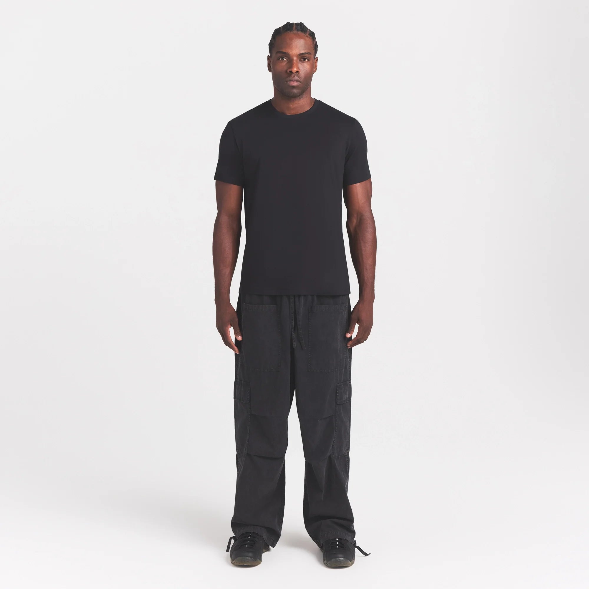 WOVEN MENS CARGO PANT | ONYX ON A MODEL FRONT VIEW @ | FOCUS: 0.0, 1.0, 0.9