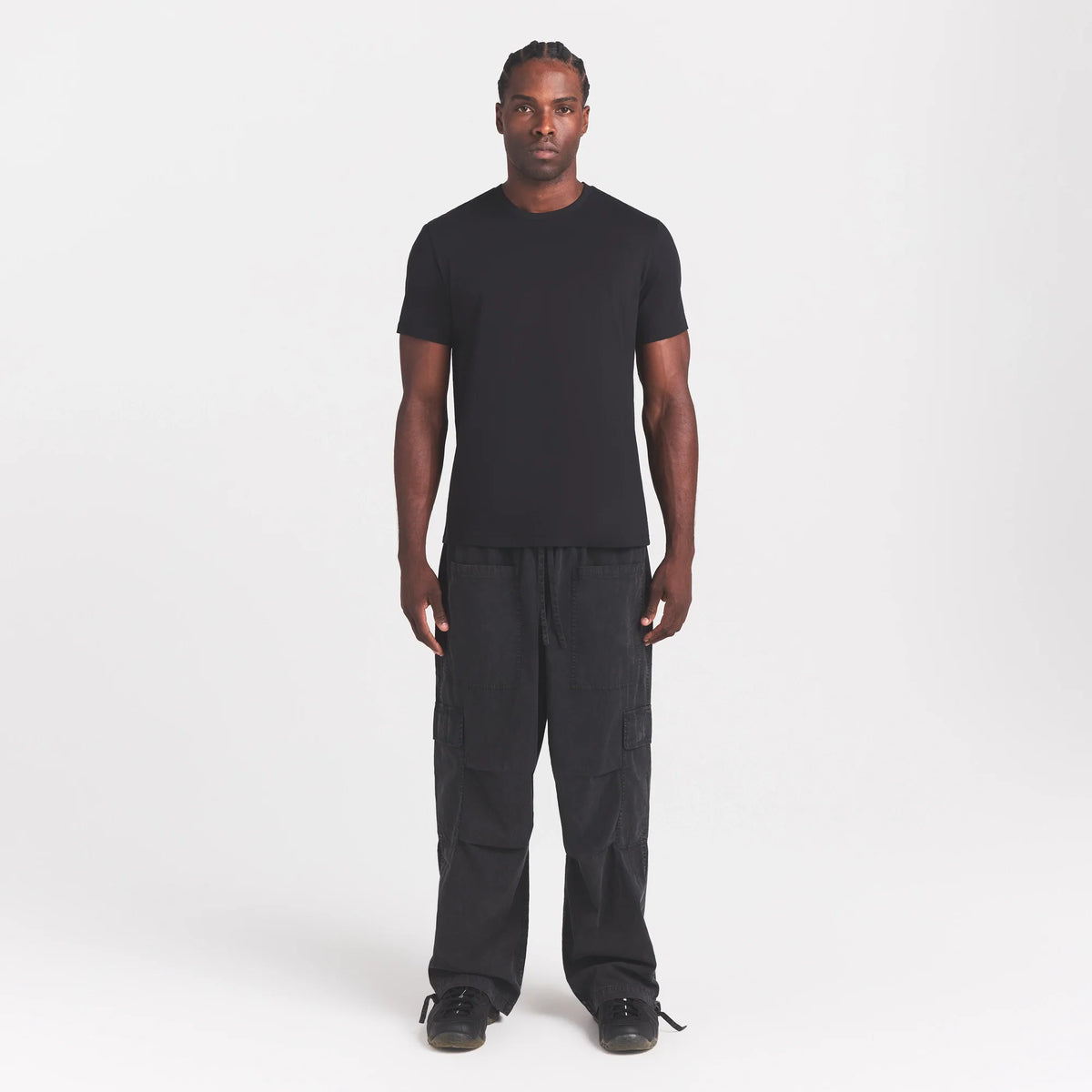 WOVEN MENS CARGO PANT | ONYX ON A MODEL FRONT VIEW @ | FOCUS: 0.0, 1.0, 0.9