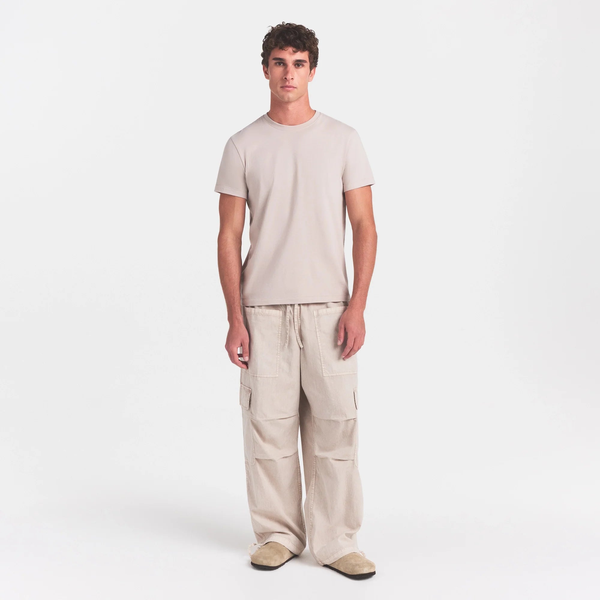 WOVEN MENS CARGO PANT | STONE ON A MODEL FRONT VIEW @ | FOCUS: 0.0, 1.0, 0.9