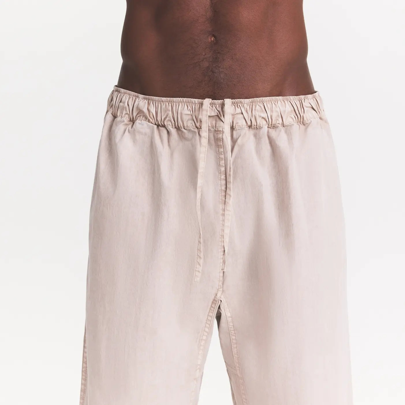 WOVEN MENS CARGO PANT | STONE ON A MODEL SIDE VIEW @ | FOCUS: 0.0, 1.0, 0.9