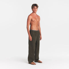 WOVEN MENS PULL-ON PANT | JUNGLE ON A MODEL SIDE VIEW @ | FOCUS: 0.0, 1.0, 0.9